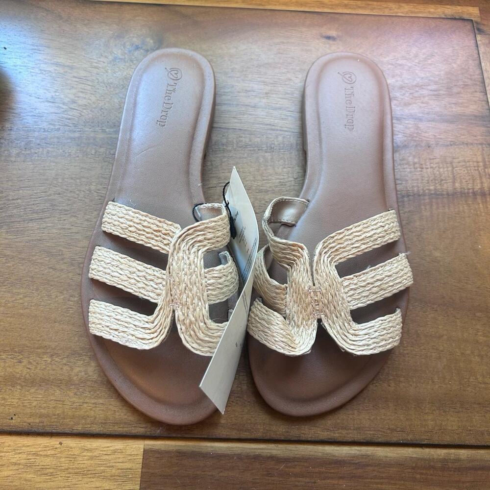 Tan sandals with a straw detailing strap